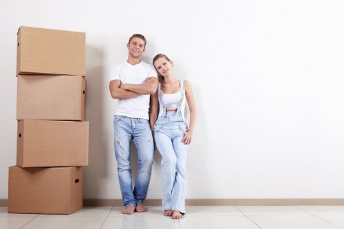 Packing boxes and moving supplies prepared for a home move in Swiss Cottage