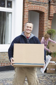 Man and van team sorting reusable household items for recycling in Swiss Cottage