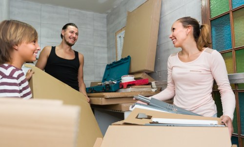 Moving team handling a flat removal in Swiss Cottage near a residential apartment block