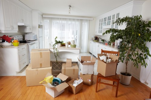 Packed boxes and furniture ready for urgent local removals
