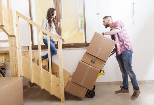 Furniture and household items prepared for storage in Swiss Cottage