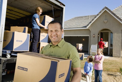 Packed office boxes and equipment prepared for transport